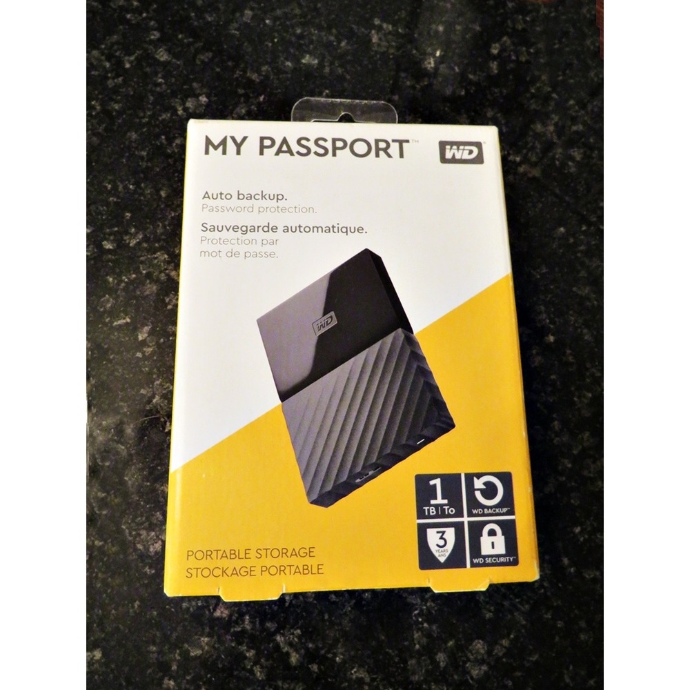 NIB WD My Passport 1TB Portable Storage Black Gray Compact Reliable Data Backup